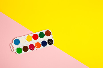 Paints brushes pencils paper colors mock up