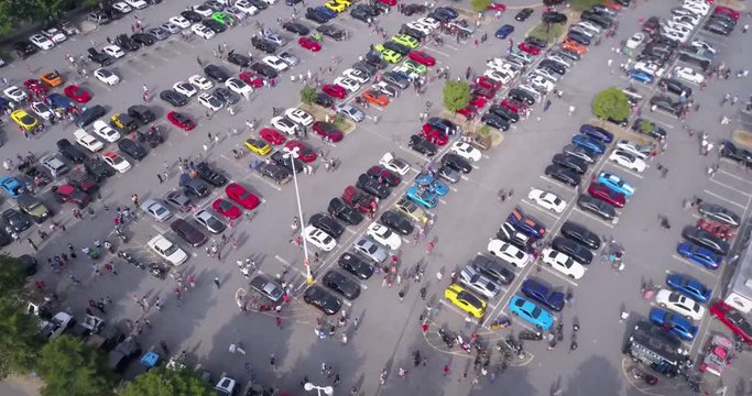 car show drone fly over parking lot slow 4k