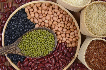 Foto op Canvas Cereal grains and Seeds beans(Black Bean, Red Bean, Peanut, Mung Bean, Thai Jasmine Rice, Brown Rice and White Rice) useful for health in wood spoons on wood background.   © Sakrapee Nopparat