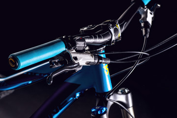 mountain bicycle photography in studio, bike frame parts, handle bar and brakes