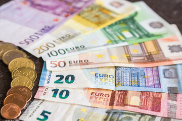 Obraz premium Euro money on the table. Happy salary day. Money background.