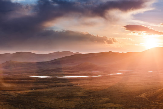 majestic sunset at mountain meadow plateau Eshtikkel, Altai