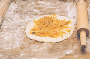 Young children make dough. 