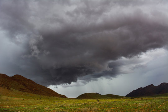 Namibia gravel road C27 storm cloud
