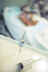 Drug on the background of lying patient
