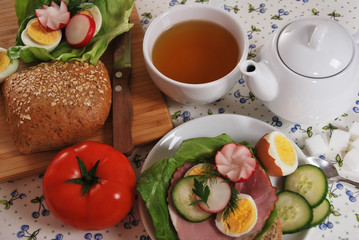 Sandwich with ham, egg, and radish made by grandma