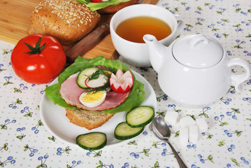 Sandwich with ham, egg, and radish made by grandma