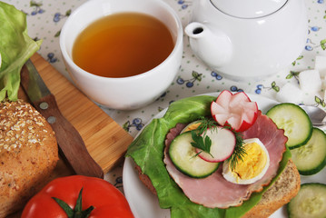 Sandwich with ham, egg, and radish made by grandma