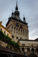 Fototapeta na wymiar Ancient and medieval clock tower in Sighisoara town at Romania