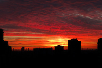 Fototapeta na wymiar City silhouette at sunrise with colorful sky