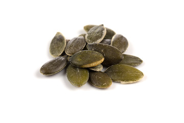Pumpkin seeds on a white background