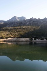 View of La Maliciosa from the Majalespino reservoir. Becerril de la Sierra. Madrid. Spain. Europe