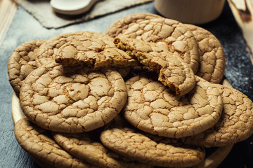 Biscuit sweet cookie background. Domestic stacked butter biscuit pattern concept,close up macro.Homemade cookies on wooden table.Cereal biscuits with the sesame,peanuts,sunflower and amaranth.