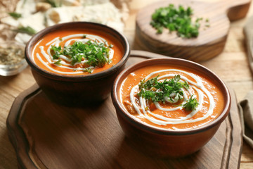 Bowls with delicious Murgh Makhani on table