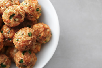 Plate with delicious turkey meatballs on light table