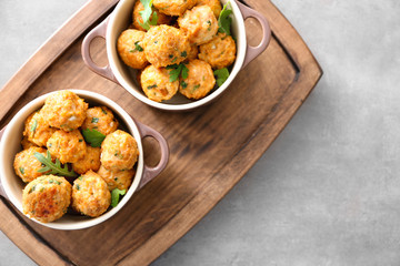 Ceramic dishes with delicious turkey meatballs on table