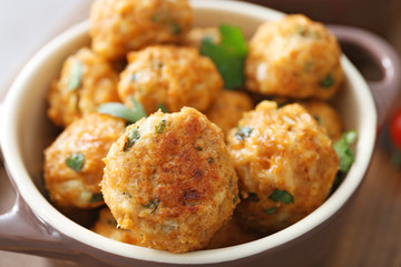 Ceramic dish with delicious turkey meatballs, closeup