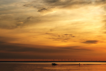 Water skiing at sunset