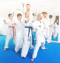 Fototapeta na wymiar Teenagers happy to attend karate class