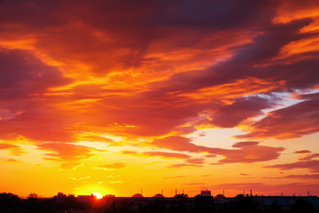 Beautiful fiery orange and red sunset sky.