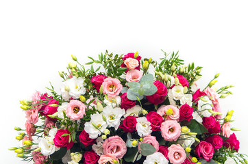 Luxurious wedding arrangement of fresh flowers in a white vase on a white background