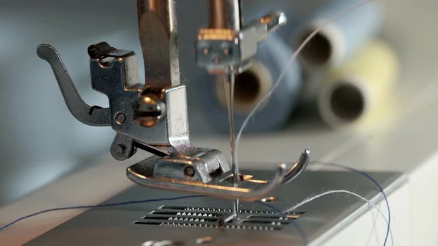 Steel spool moving while sewing machine is working
