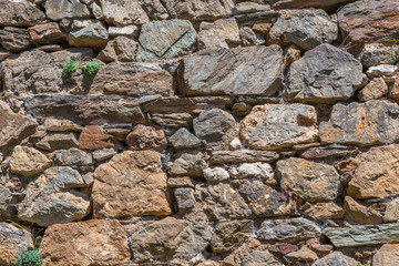 a stone wall in Lastrous castle