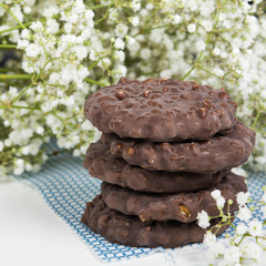 Cookies stack on tissue over white background