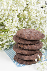 Cookies stack on tissue over white background