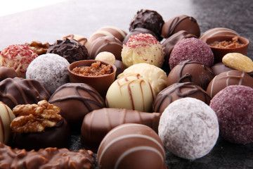 a lot of variety chocolate pralines, belgian confectionery gourmet chocolate