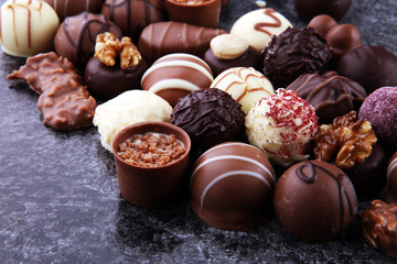 a lot of variety chocolate pralines, belgian confectionery gourmet chocolate