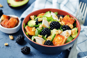 Crispy goat cheese blackberry arugula chicken avocado salad