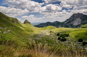 View at the plateau and a lake between the mountain range
