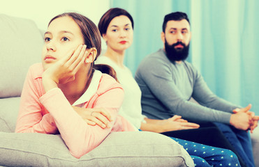 Parents lecturing daughter