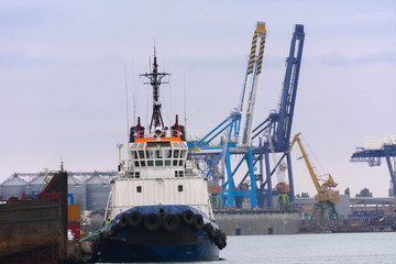 Tower cranes in the merchant seaport of Odessa in the evening of July 12, 2017