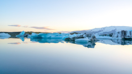 Icebergs in Jokulsarlon glacial lake at sunset, Iceland