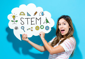 STEM text with young woman holding a speech bubble on a blue background