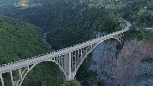Aerial view of Durdevica Tara arc bridge in the mountains, One of the highest automobile bridges in Europe.