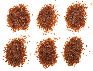 Red rice on white background
