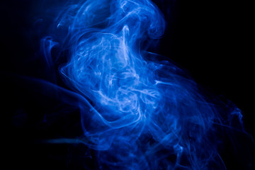 Blue toxic fumes movement on a black background.