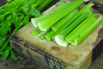 Fresh green celery isolated on white background