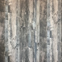 The wall is black./The room is decorated with vintage wood wall./Wood for living room./Wood for interior and exterior For a home that needs vintage./Walls and wood flooring make the home .





