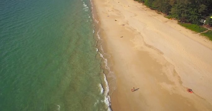 Unspoilt and Quiet Nai Thon Beach, Phuket, Thailand, Descend with Tilt Aerial Shot

