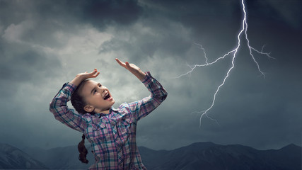 Fototapeta na wymiar Kid scared with lightning. Mixed media
