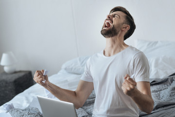 Devastated young man showing his emotions