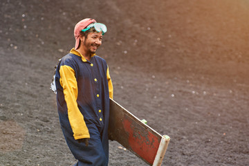 Happy smile man after volcano boarding