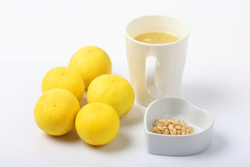 Lemon juice against cancer on white background.