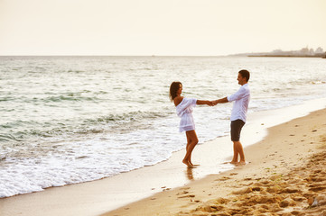 young romantic couple on the seaside