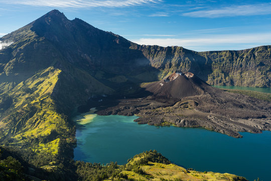 Rinjani peak and Barujari volcano mountain in a beautiful morning, Lombok island, Indonesia