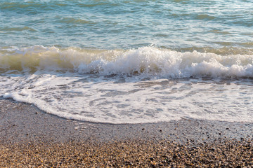 Sea surf on a stony beach.